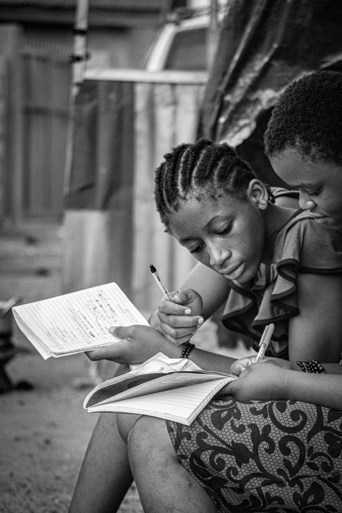 Students studying together outdoors in Abuja